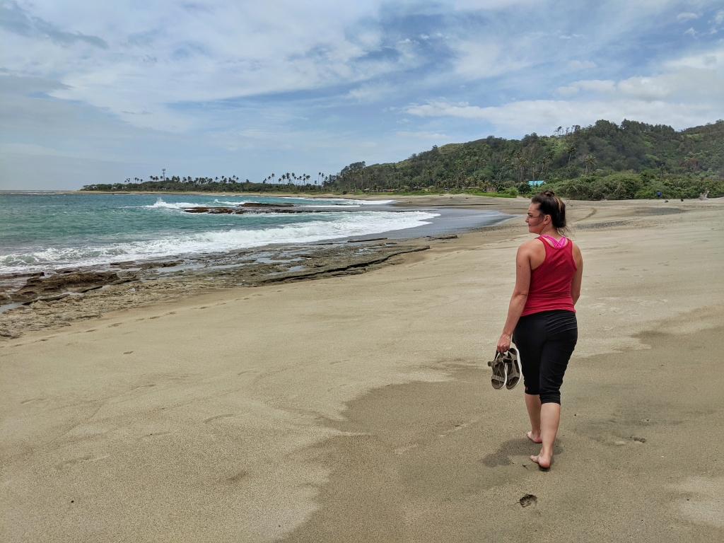 Caroline walking on the beach in Fiji